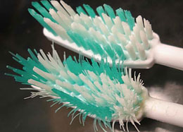 two toothbrushes close up